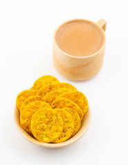Indian Street Snack Food Masala Khari Served With Tea on White Background