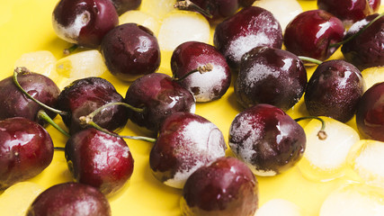 Frozen cherries and ice cubes