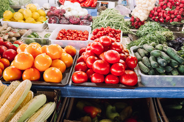 big choice of fresh vegetables on market counter