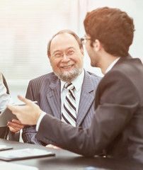 two business team works with the financial documents in the office