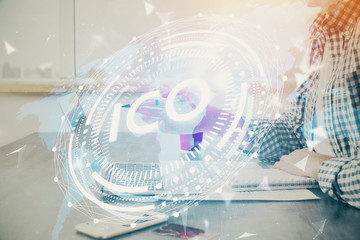 Blockchain theme hud with man working on computer on background. Concept of crypto chain. Double exposure.