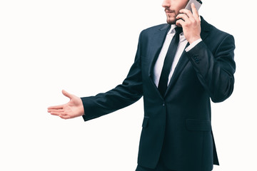 businessman is engaged in a dialogue on a cell phone