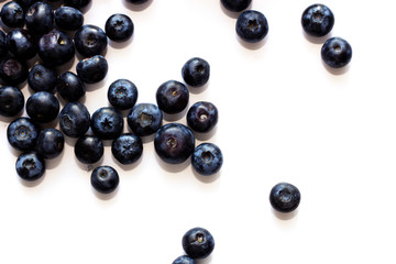 Blueberry on white background top view with copy space.