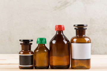 Retro pharmacy - vintage pharmacy bottles on wooden board