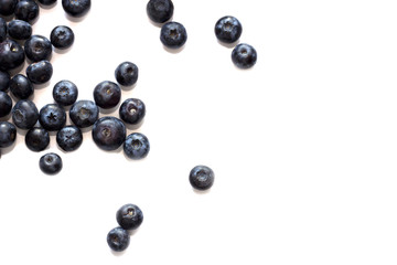 Blueberry on white background top view with copy space.