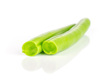 Group of two halves of fresh green bean isolated on white background