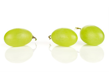 Group of three whole fresh green grape in row isolated on white background