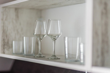 Glasses in a vintage style shelf