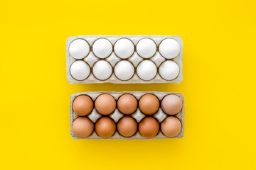 Farm products design for blog with eggs on yellow background top view