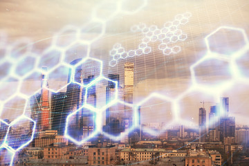 Double exposure of abstract technology drawing on cityscape background. Concept of tech innovation