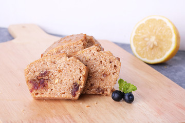 Classic lemon pound cake on wooden board