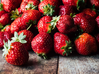 Strawberry background. Red ripe organic strawberries