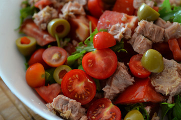 fresh salad with arugula and cherry tomatoes