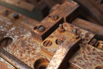 Detail of rusty screws and nut