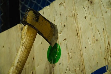 Axe stick on the bullseye target in Throwing axe new trend sport