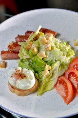 caesar salad on a white plate