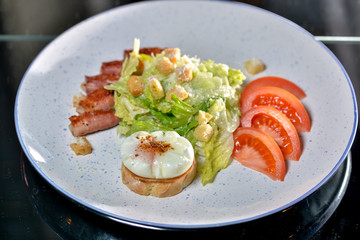 caesar salad on a white plate