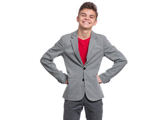 Handsome caucasian Teen Boy in suit isolated on white background. Teenager looking at camera. Happy child - close-up portrait.