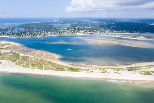 The nutrient-rich waters of the Atlantic Ocean bathe a scenic beach on Cape Cod, Massachusetts. This beautiful area of New England, not too far from Boston, is a popular summer vacation destination.