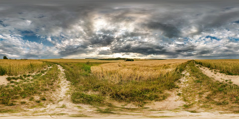 full seamless spherical hdri panorama 360 degrees angle view on gravel road among fields in summer...