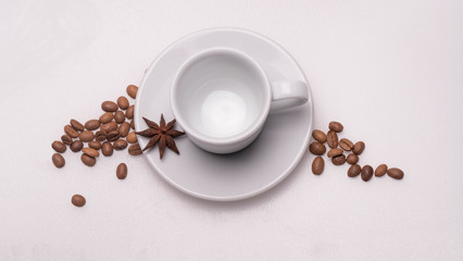 espresso cup coffee beans and anise