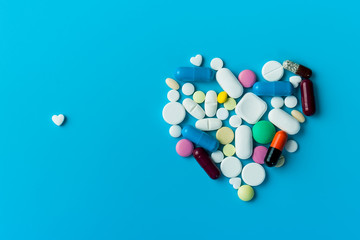 Assorted pharmaceutical medicine pills. Two Heart shape