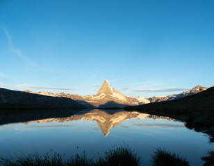 Fototapeta na wymiar golden sunrise at the matterhorn in the swiss alps