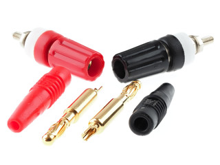 Red and black banana plugs and sockets, isolated on vhite