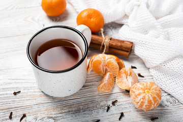 High angle of hot tea with mandarins