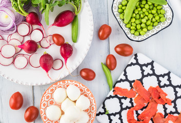 Bowl of salad with smocked salmon.