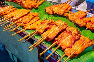 Grilled chicken skewer on Banana leaf , thai street food