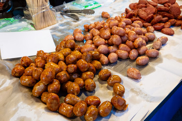 Fried potatoes in big pan, street food
