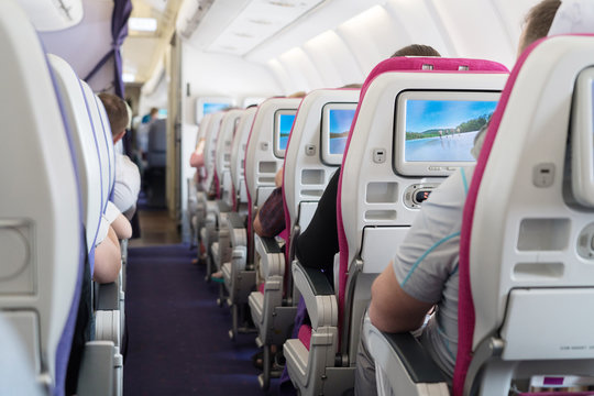 View of Passenger Aisle Seats  inside Airplane