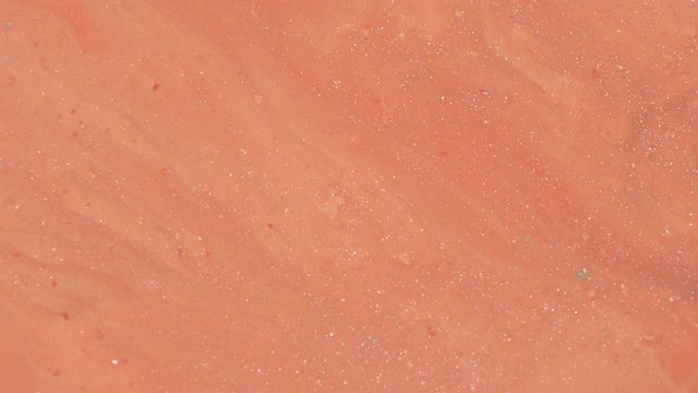Terracotta, ochre, red clay, orange, coral liquid glitter paint texture