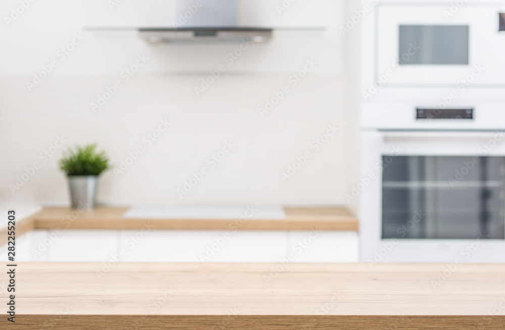 Wall mural empty kitchen desk an modern interior in the background