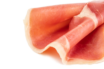 Italian prosciutto crudo or jamon. Raw ham. Isolated on white background