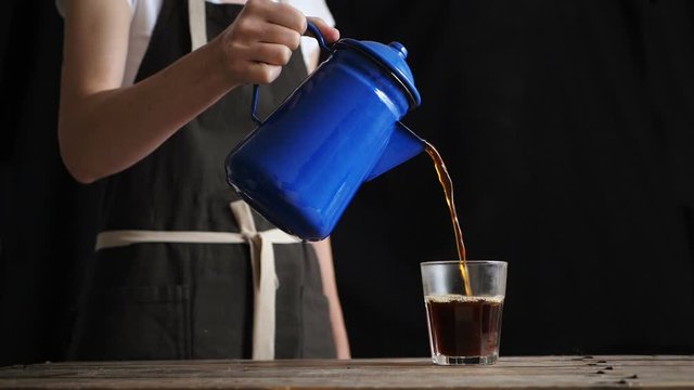 Coffee from pot in coffee shop cafe seamless cinemagraph