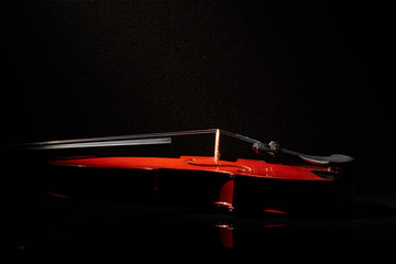 Violin on a black background © badahos