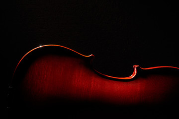 Violin on a black background © badahos