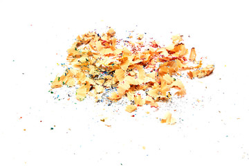 Shavings from multicolored pencils on white