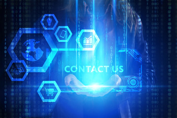 The concept of business, technology, the Internet and the network. A young entrepreneur working on a virtual screen of the future and sees the inscription: Contact us