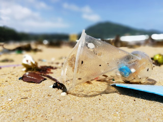 Pollution of plastic waste in the sea that comes to the beach