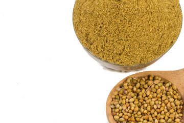 Coriander powder with coriander seeds.