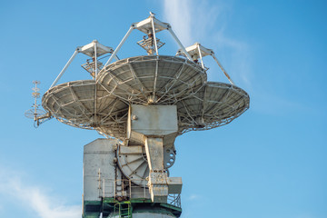 Antennas for communication with spacecraft. Satellite sea vessel with satellite dish.