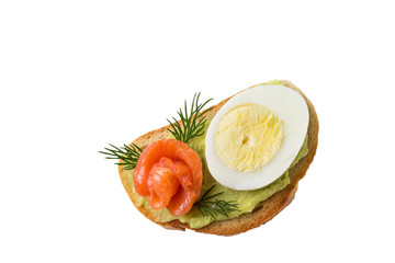 Sandwich with salmon egg and avocado on a white background.