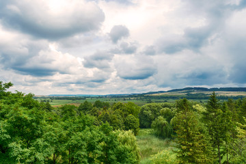 Fototapeta premium Landscape with beautiful cloudy sky and nature. Nature.