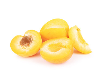 Apricot fruits with leaves isolated on white background