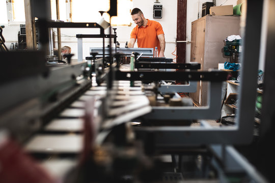 An Old Printing Machine In Printing Factory