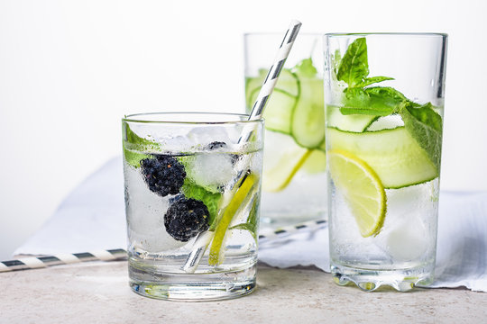Cooling drink with lime, cucumber, basil and blackberry.