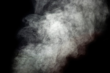 Light flow of smoke on a black background